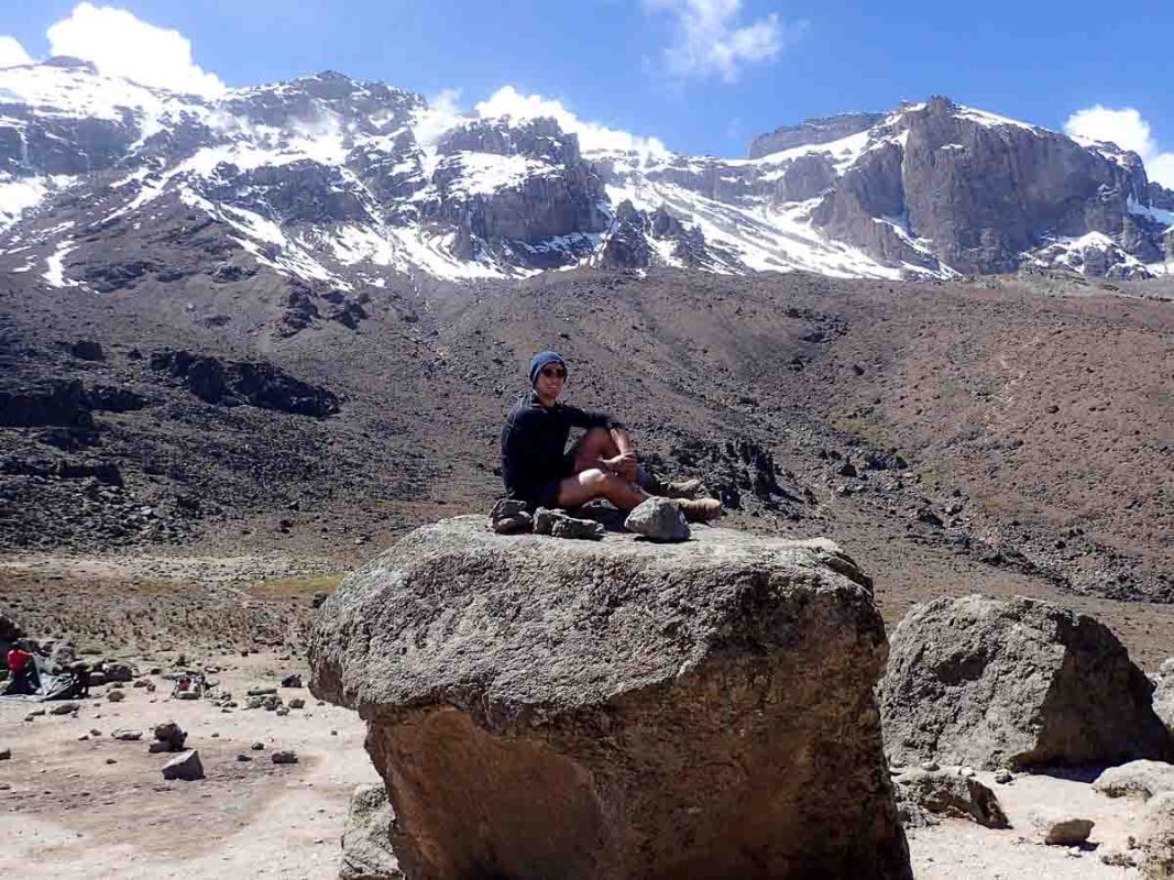 Sitting on a rock halfway up Kilimanjaro