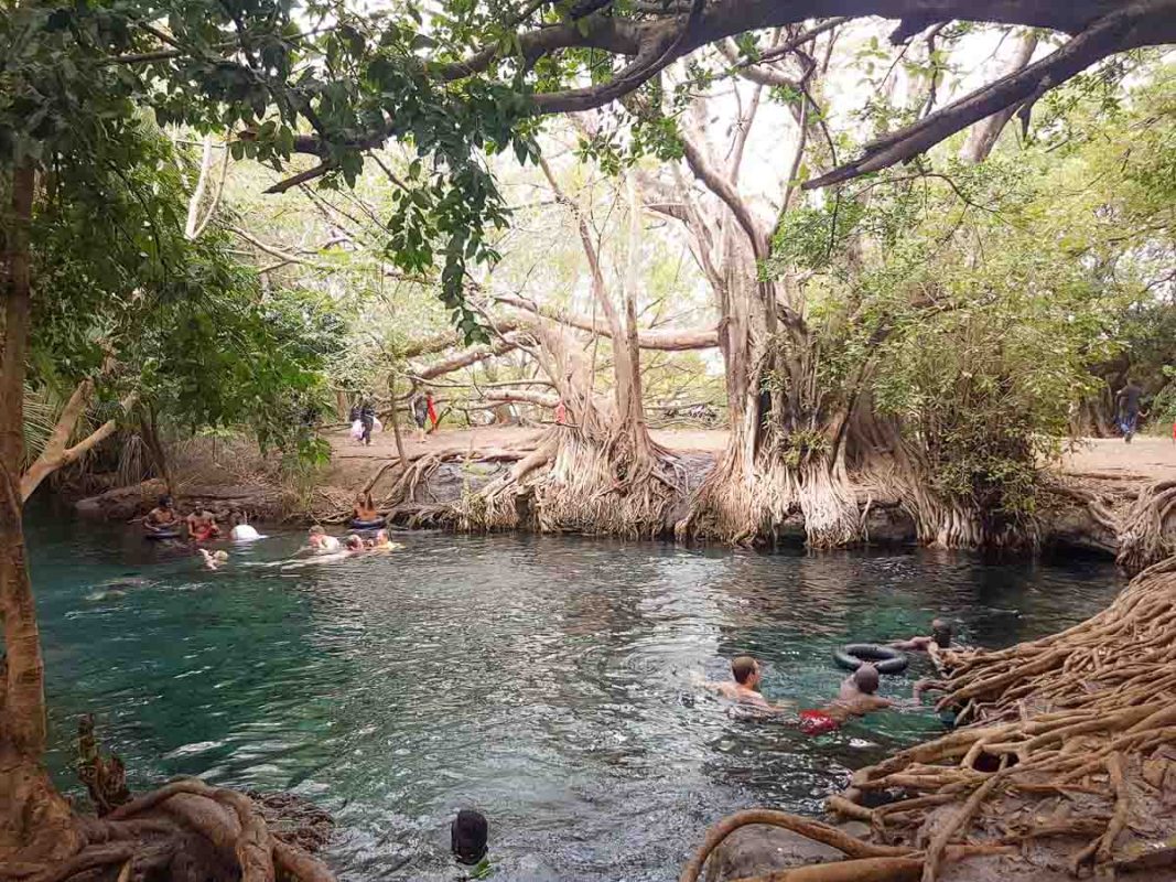 Tristan Balme swimming at kiluletwa hot springs near moshi tanzania