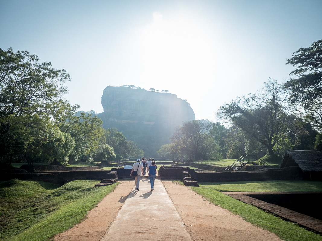 Early morning approach through the Sigiriya water gardens toward Lion Rock