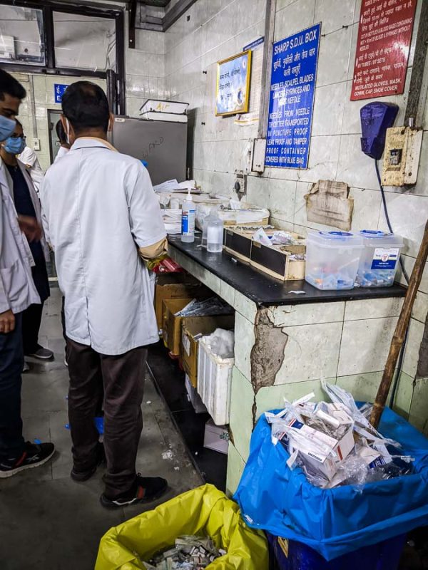 Tristan Balme preparing rabies vaccine in indian hospital