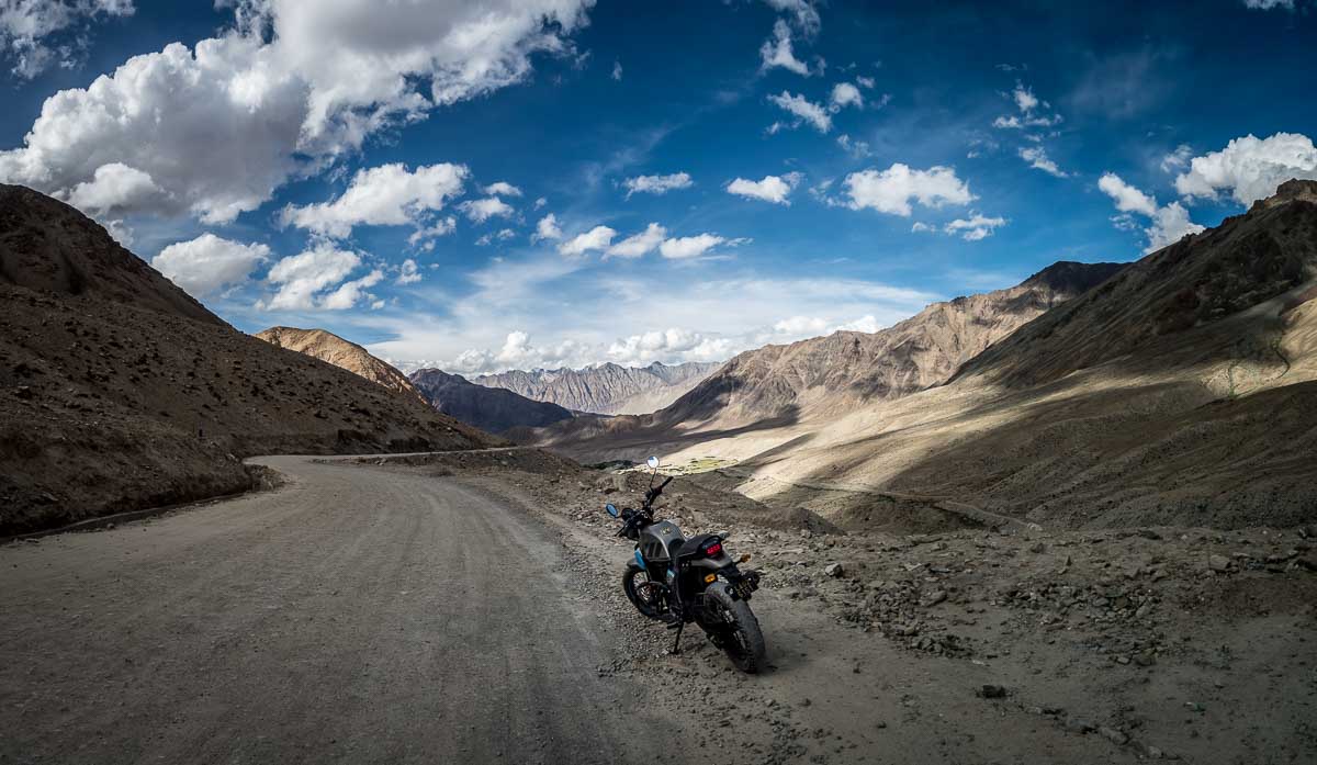 Tristan Balme riding a motorbike across ladakh