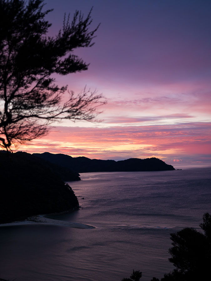 Pink sunset over an Abel Tasman beach