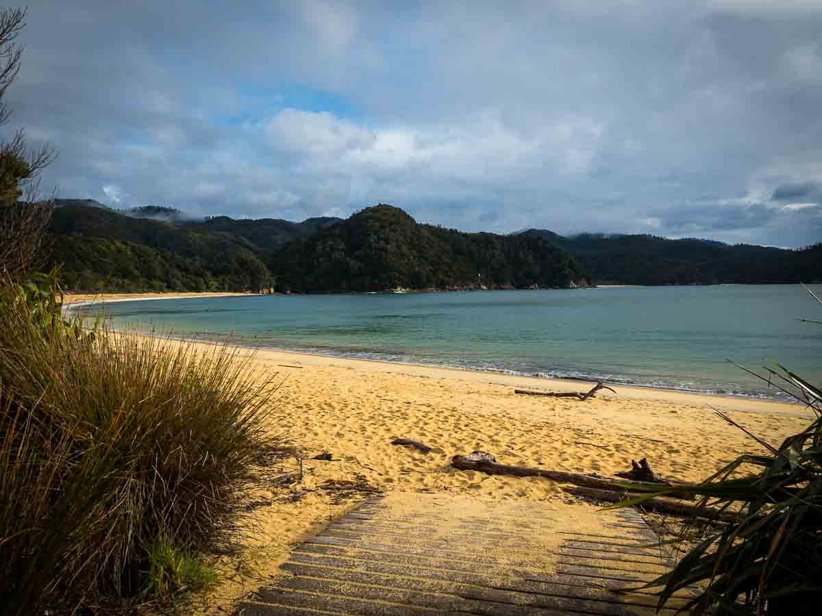 Golden beach and green headlands on the southern Abel Tasman Coast Track