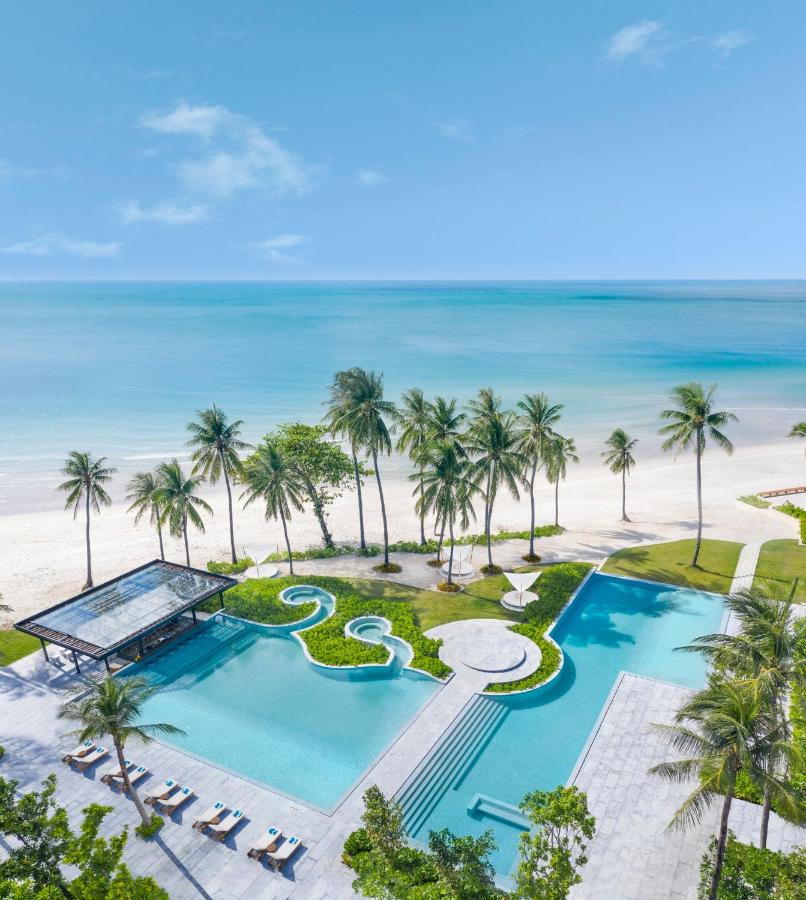 Beachfront pool and gardens at Centara Reserve Samui