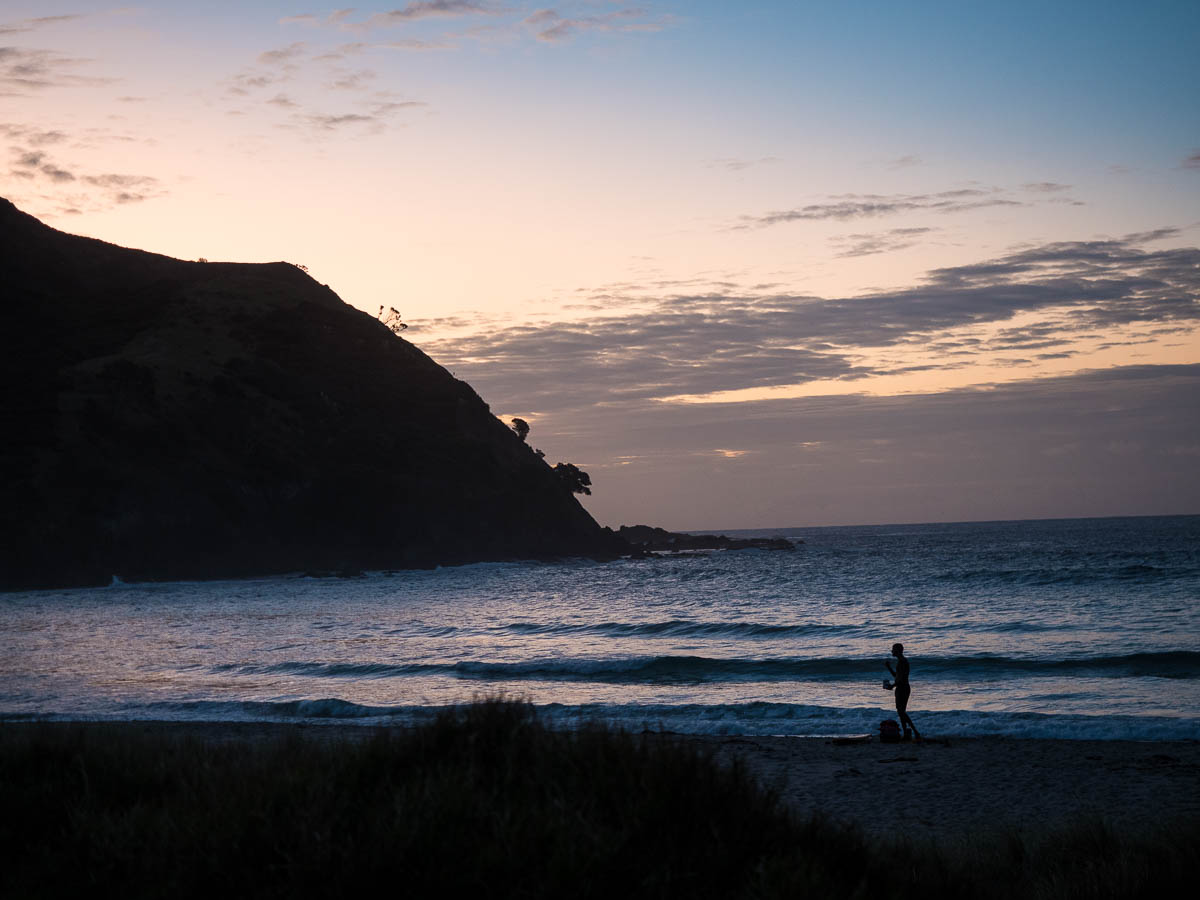 Sunset beside a Te Paki Coastal Track campsite