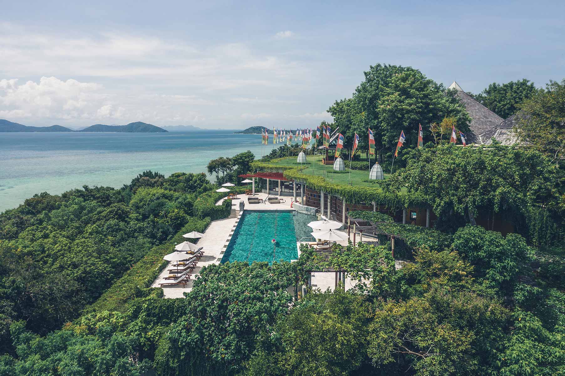 Kamalaya Koh Samui lap pool overlooking the green hillside and sea