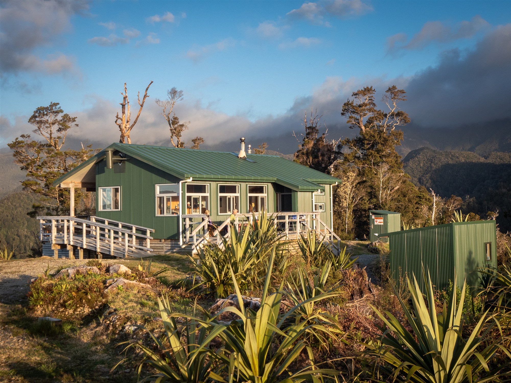 Pororari Hut in evening light on the Paparoa Track