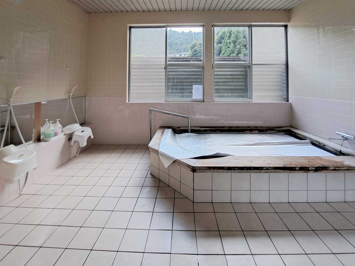 Simple indoor onsen bath at a ryokan on the Kumano Kodo